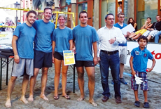 image : Employees participate in a volleyball competition